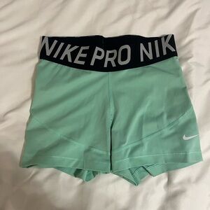 Nike Pros mint green